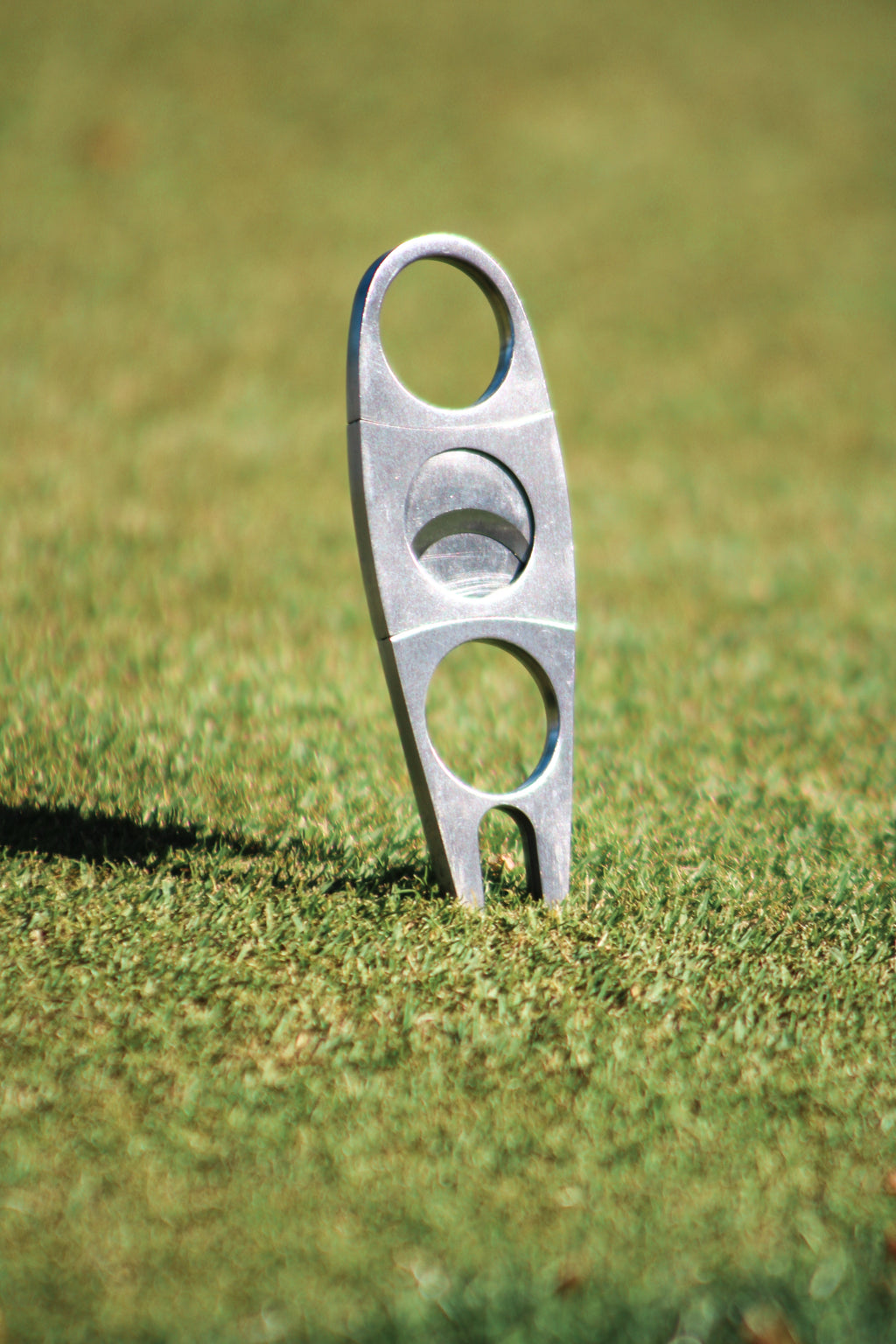 Cigar Cutter + Divot Repair Tool